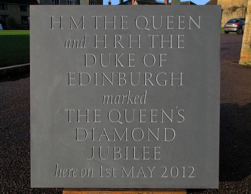 A tablet to mark the Queen's visit to Sherborne Abbey.